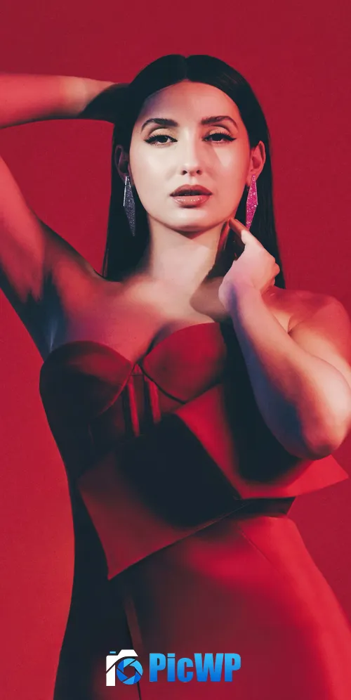 Nora Fatehi Red background 3K Mobile Wallpaper