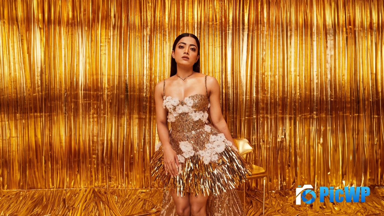 Rashmika Mandanna Golden background 4K PC Wallpaper
