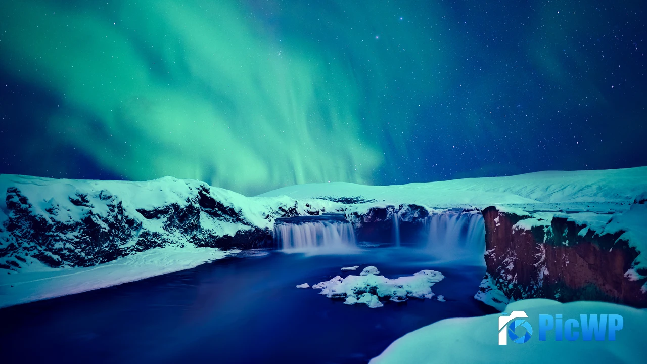 Snow covered Godafoss waterfall 4K PC Wallpaper