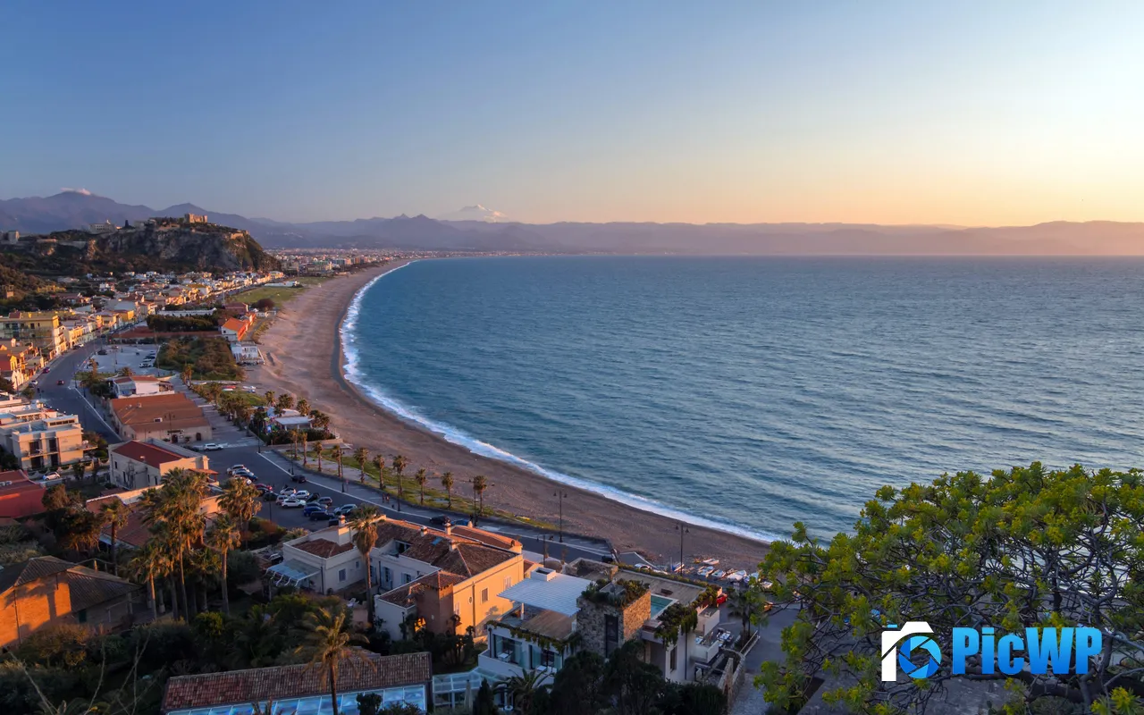 Coastal Town illuminated Dusk Calm sea Summer 5K PC Wallpaper