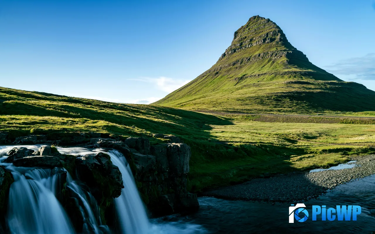 Green grass Kirkjufell Mountain Small Waterfall Iceland 5K PC Wallpaper