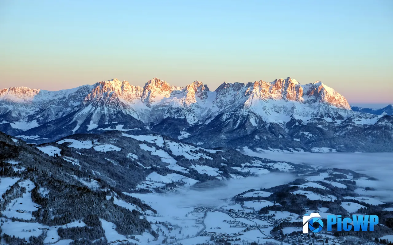 Winter Snow capped Mountains Hills Kitzbuhel Austria 5K PC Wallpaper