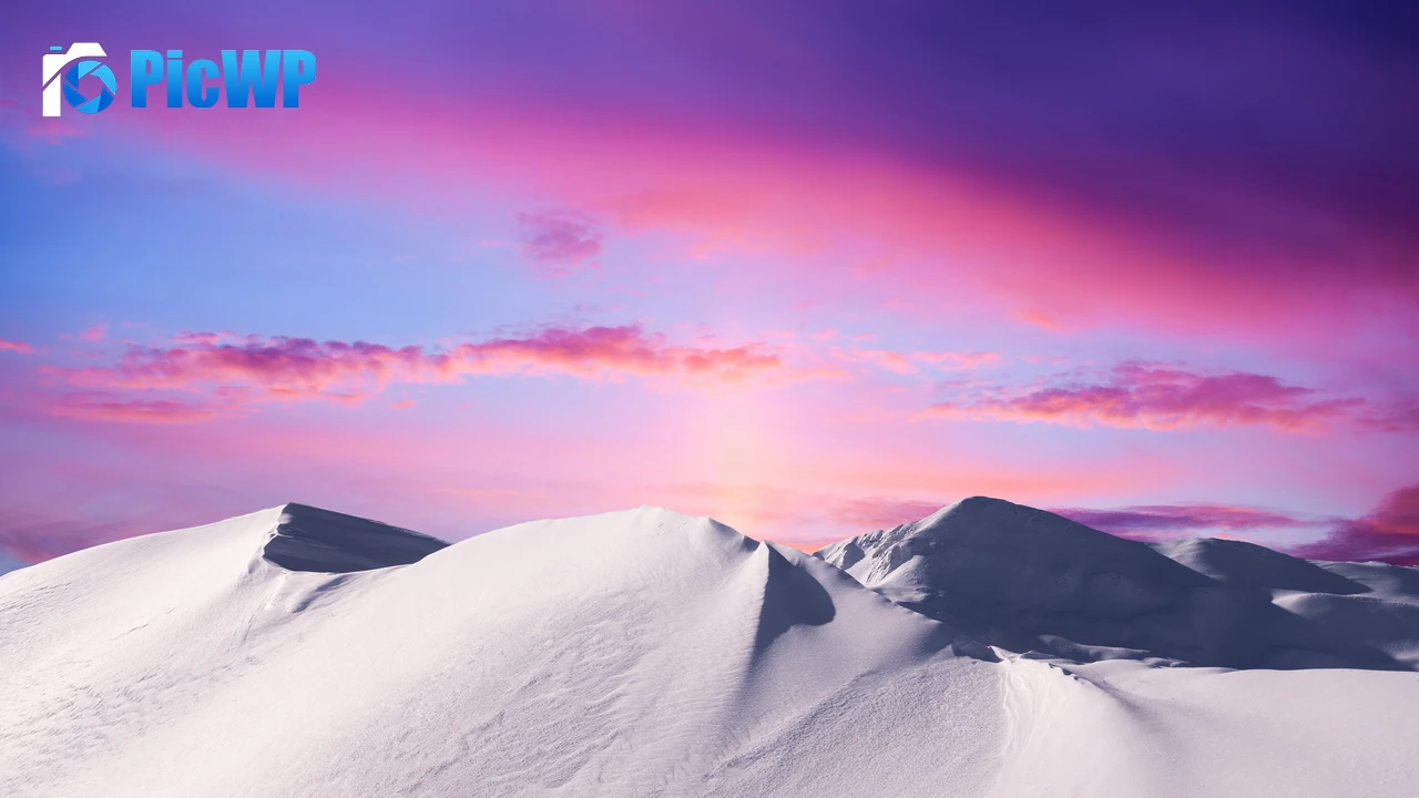 Snowy mountain with a Sunset in the background 4K PC Wallpaper