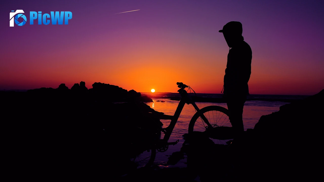 Silhouette Man in Hoodie during Sunset 4K PC Wallpaper