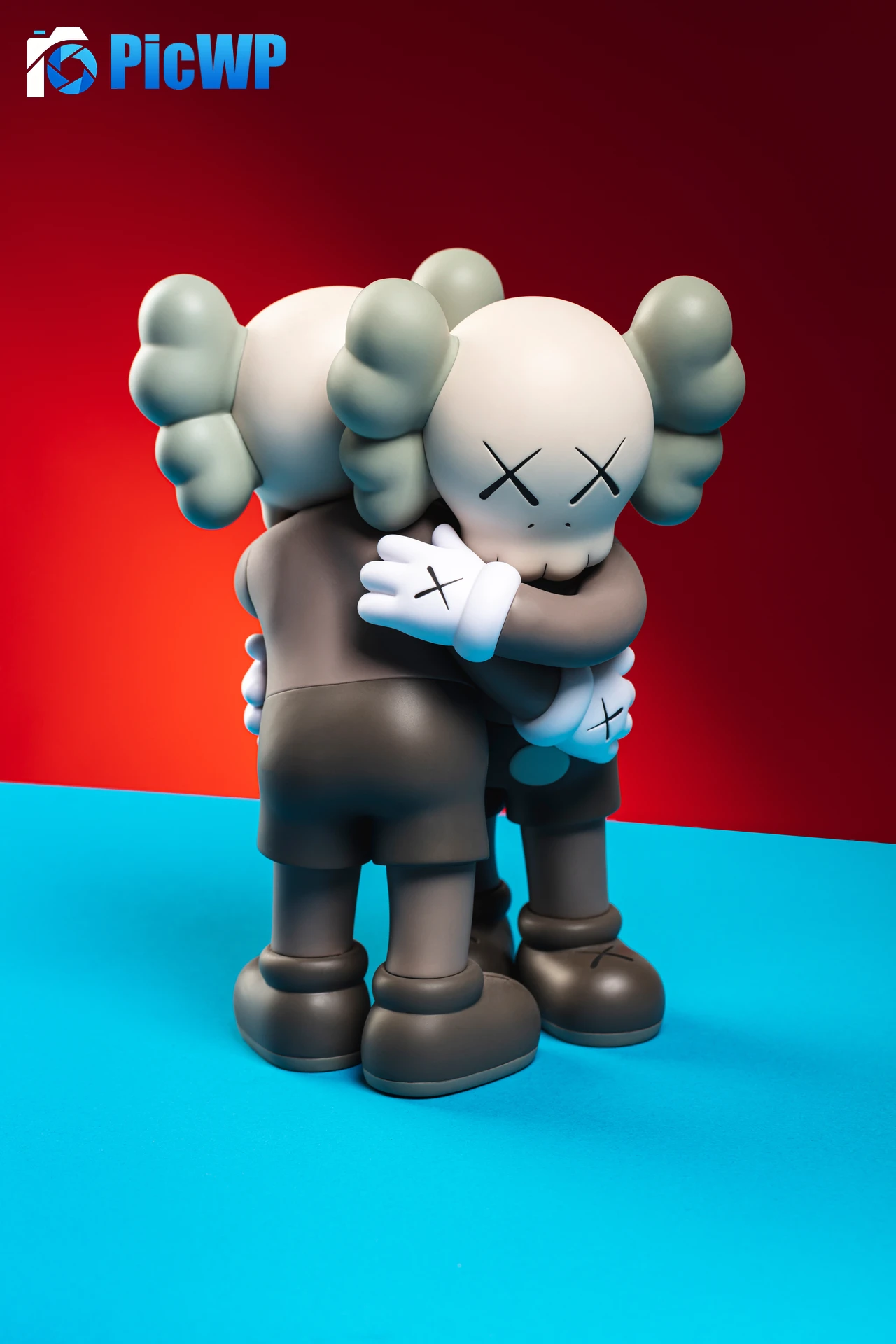 Kaws Companion Kaws hugging 9K Mobile Wallpaper