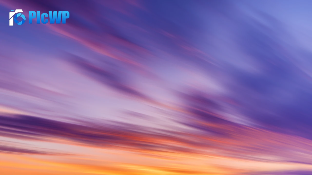 Sunset sky with purple and orange clouds 6K PC Wallpaper