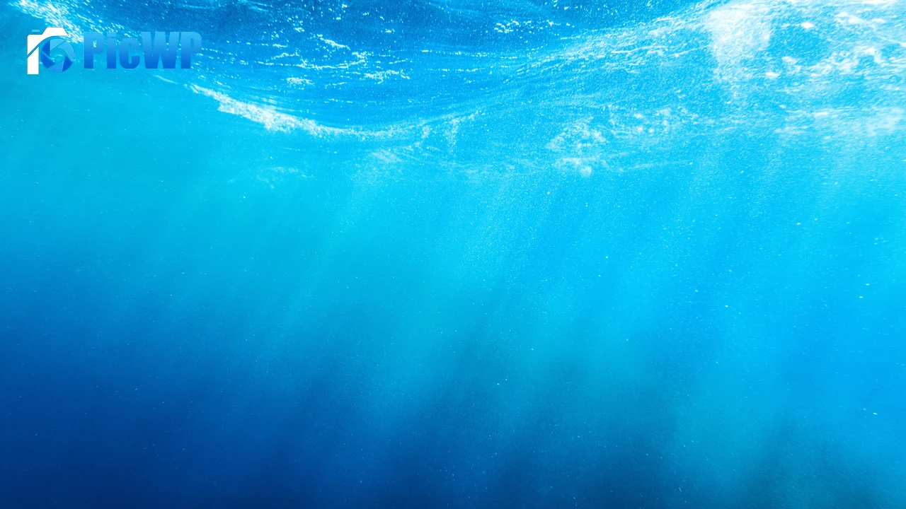 Underwater Sun rays 8K PC Wallpaper