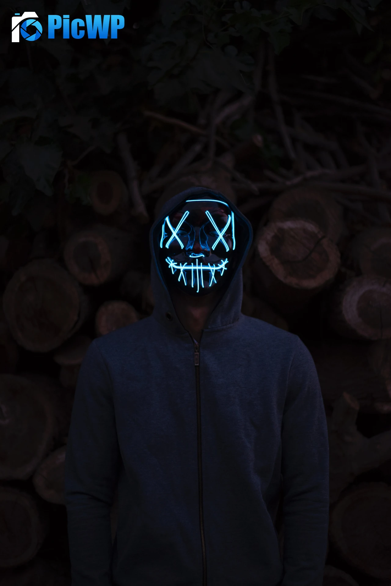 Man in LED mask iPhone 7K Mobile Wallpaper