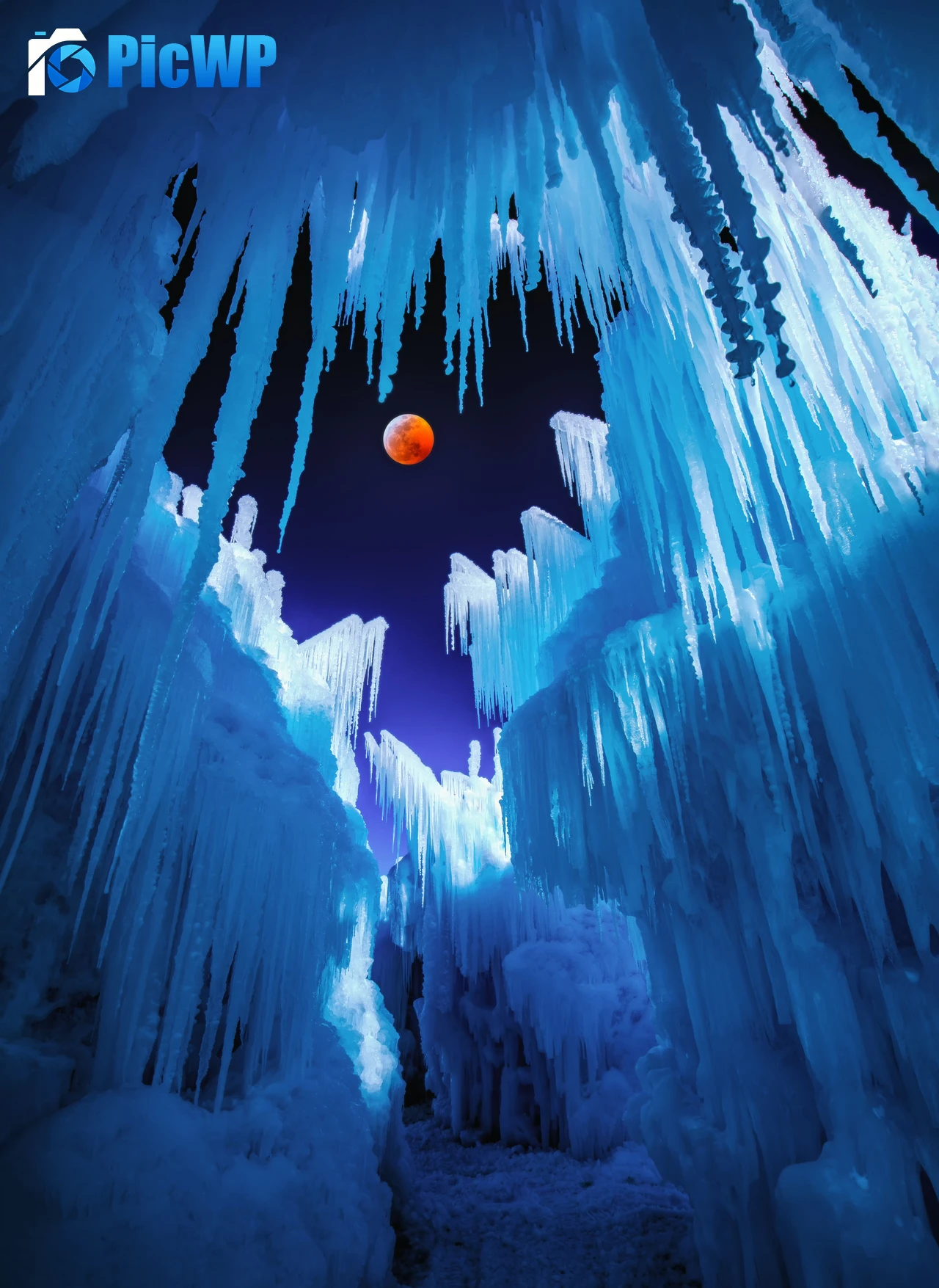 Ice Castles Eclipse 7K Mobile Wallpaper